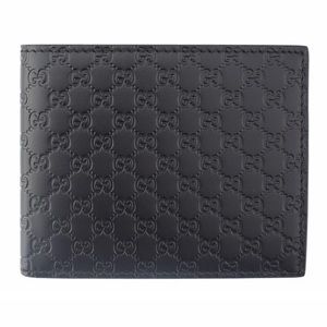 New Black leather Gucci Microguccissima bi-fold wallet
4.3” x 3.5” x 0.5”